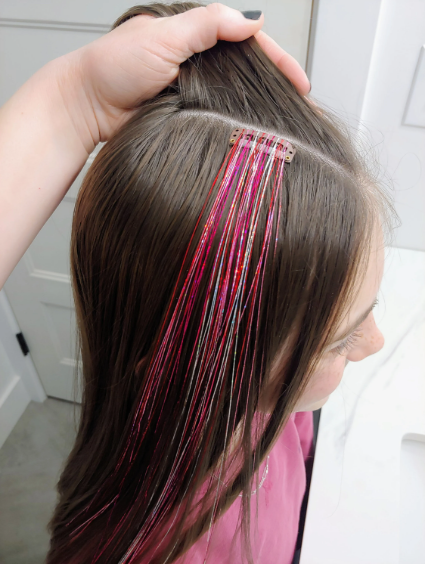 How to Add Sparkle to Your Holiday Hair with Glitter and Tinsel